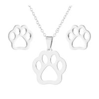 Set collar y aretes huellita de perro plateado