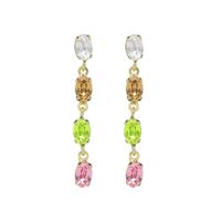 Pendientes Victoria Cruz  largos cascada color multicolor bañados en oro