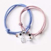 Pulsera doble con imán astronautas para mejores amigos o parejas rosa y celeste