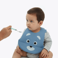 BABERO CON BOLSILLO DE SILICONA AZUL OSITO