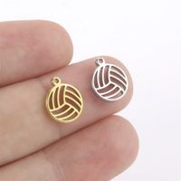 Set x 2 dijes pequeños pelota de voley en dorado y plateado