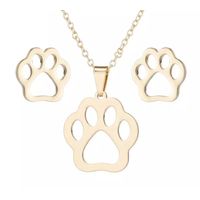 Set collar y aretes huellita de perro dorado