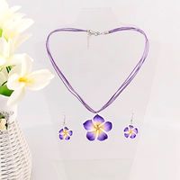 Set collar y aretes flores moradas