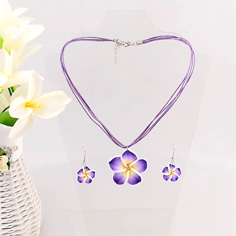 Set collar y aretes flores moradas