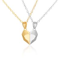 Collar doble corazón dorado y plateado con imán para parejas
