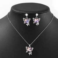 Set collar y aretes mariposa doble plateado con rosado + cajita regalo San Valentín