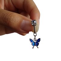 Piercing a presión falso para ombligo mariposa plateada con azul