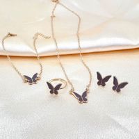 Set joyas mariposa collar, aretes, anillo y pulsera dorado con marrón