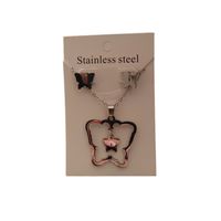 Set collar y aretes mariposa doble plateada