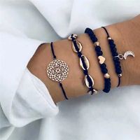 Set x 4 pulseras doradas y negro para mujer corazón luna conchitas de mar