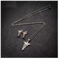 Set collar y aretes esculapio medicina plateado acero inoxidable