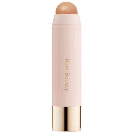 Warm Wishes Effortless Cream Bronzer Stick Tono Power Boost - Rare Beauty
