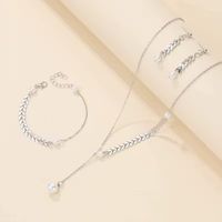 Set collar, aretes y pulsera perlitas para mujer plateado
