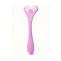 Masajeador Facial de Mano en Color Rosa – Herramienta de Cuidado Personal