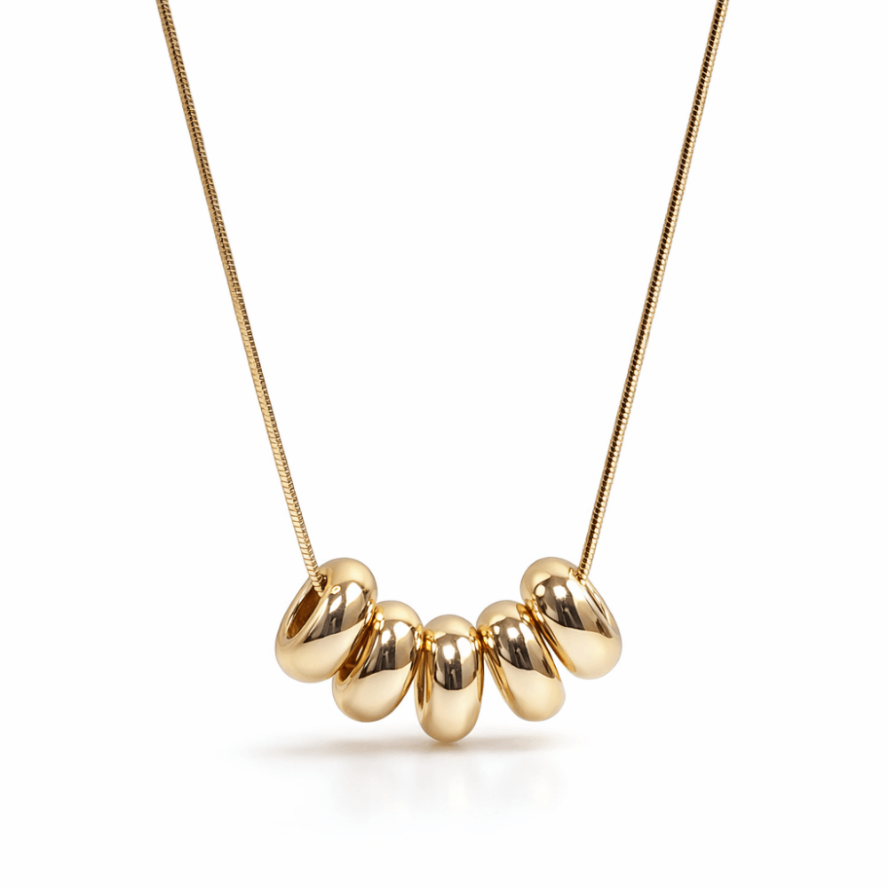 COLLAR CON CUENTAS OVALADAS DORADO