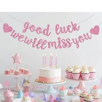 Cadeneta banderines despedida good luck we will miss you escarchado color rosado