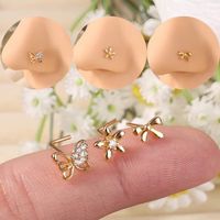 Set x 3 piercings en forma de L para nariz nostril mariposa, lacito, flor dorado