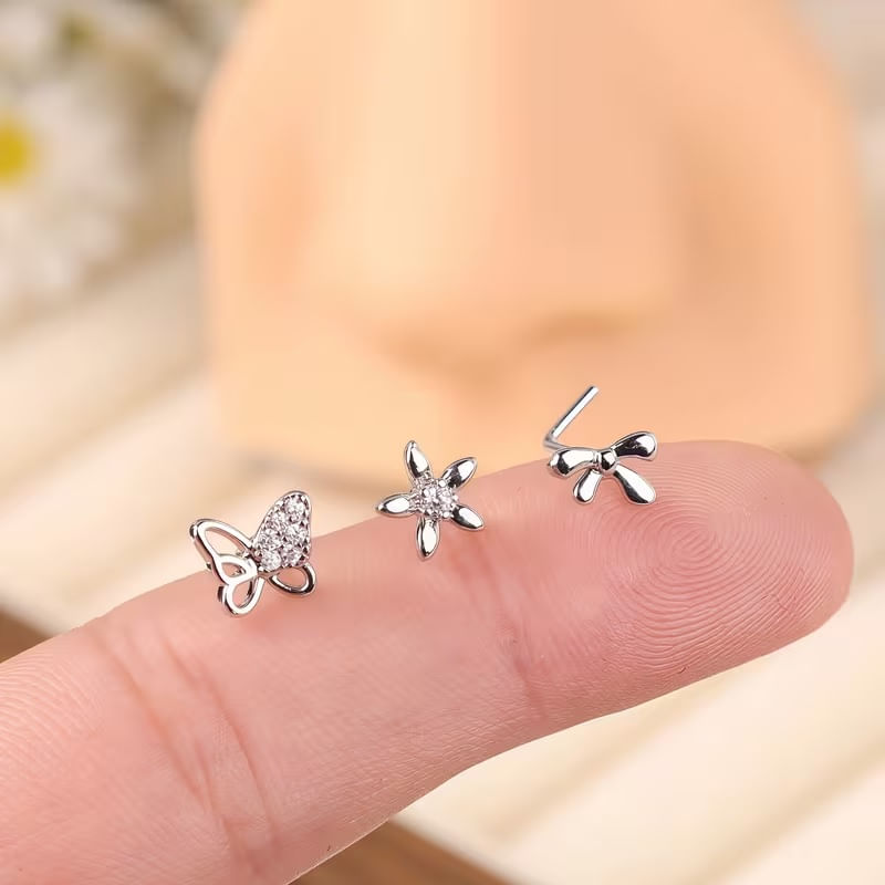 Set x 3 piercings en forma de L para nariz nostril mariposa, lacito, flor plateado