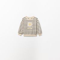 Polera Niña Sfera Rayas Flor Crochet Crudo
