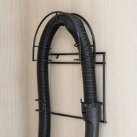 Organizador negro de pared para manguera y accesorios de aspiradora Más Casa Perú