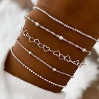 Set x 5 pulseras delgadas plateadas con corazones para mujer